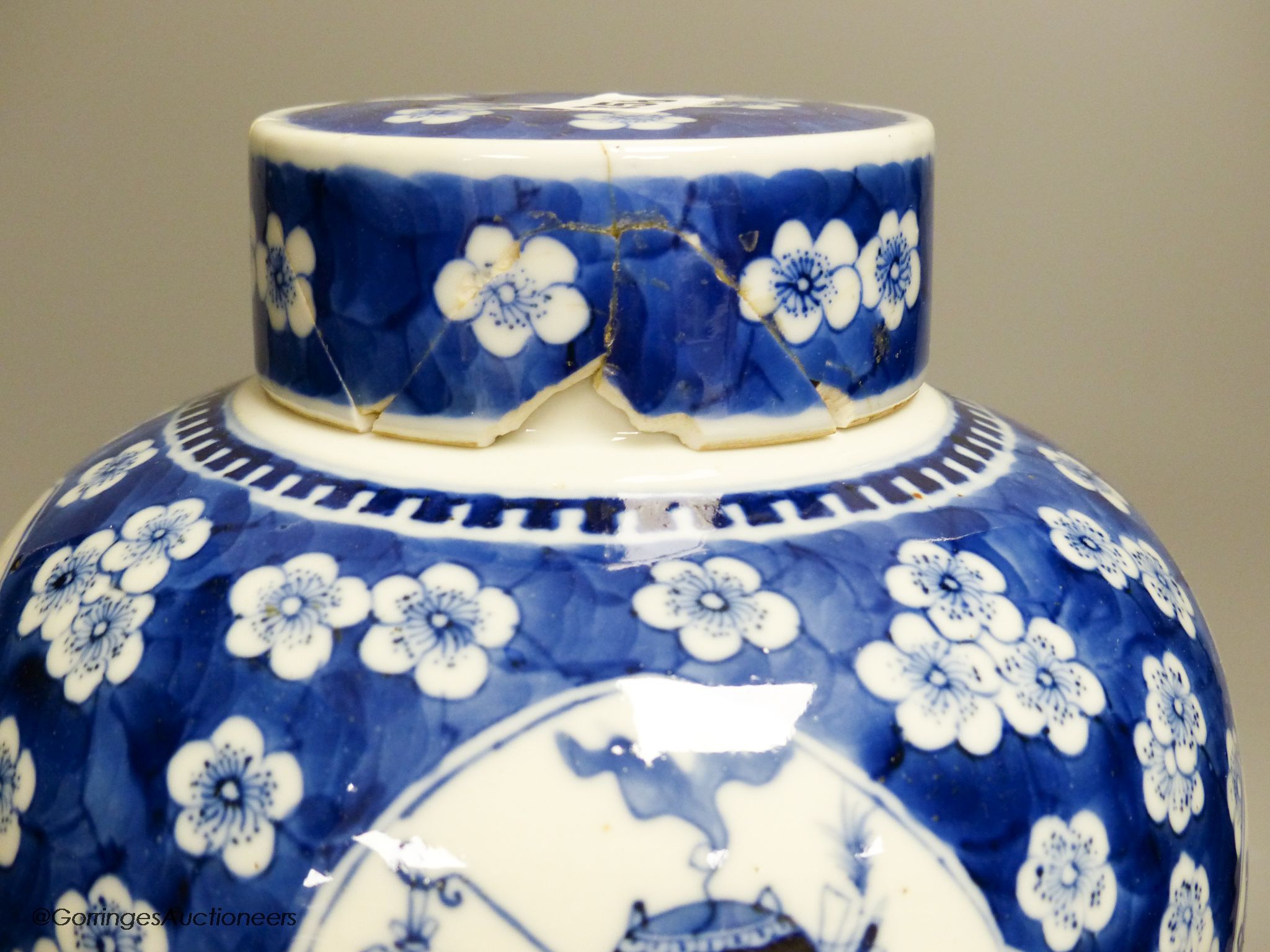 A Chinese blue and white 'Hundred Antiques' jar, Kangxi mark, c.1900